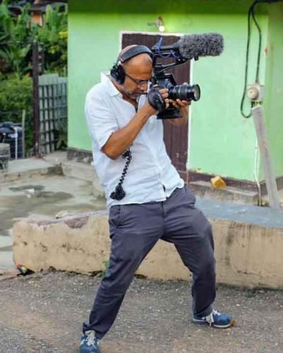 filmmaker shooting film on location