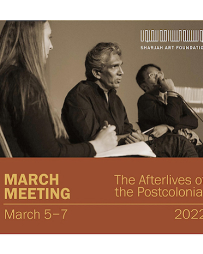Three figures seated, in discussion, March Meeting March 5-7 2022