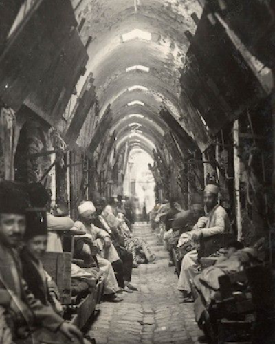 Image of people gathered in Aleppo market, c 1925